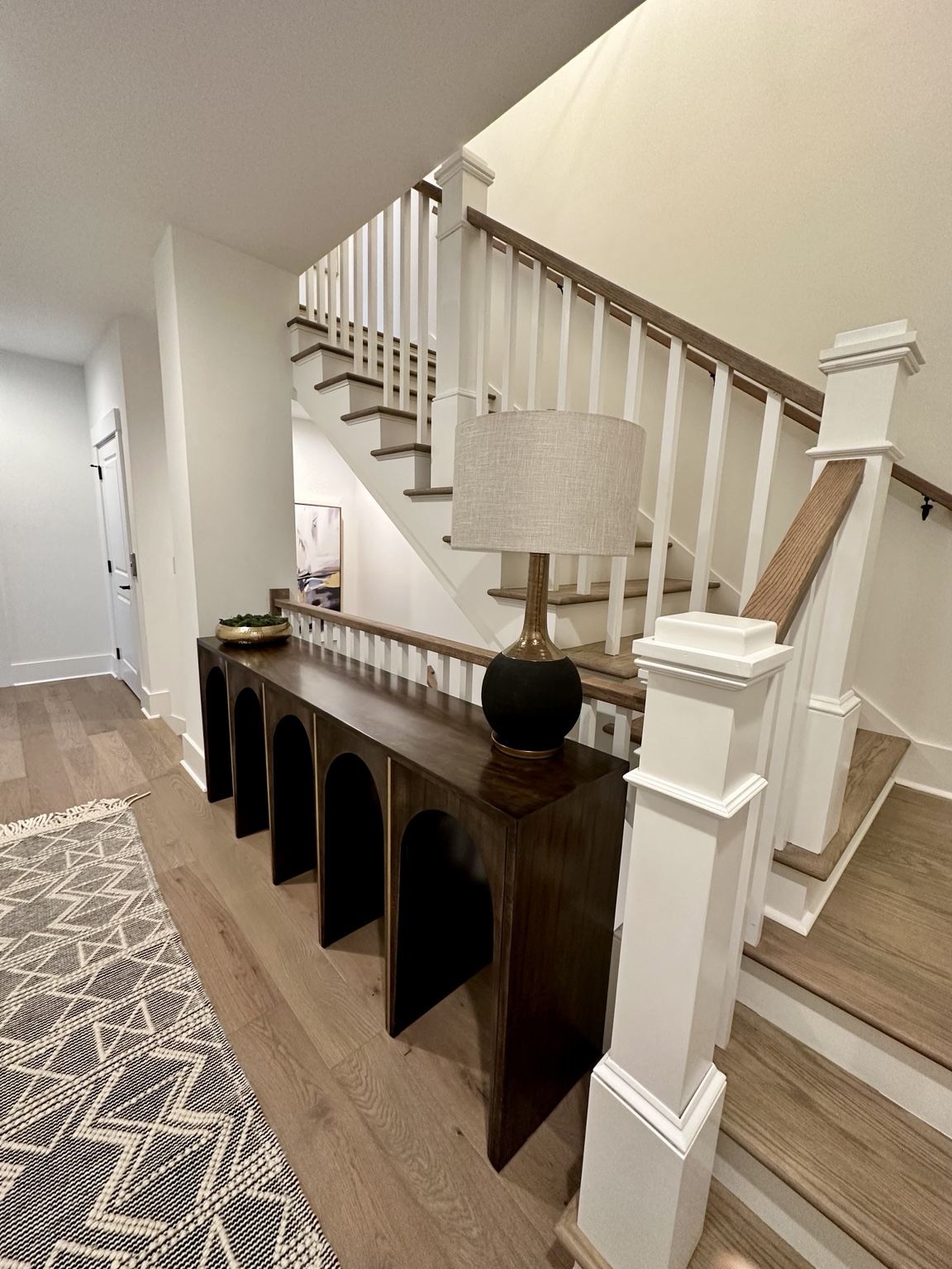 Designed staircase and sculptural console table